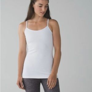 Lulu Lemon t-back tank. Worn once. S built in support bra. White.
